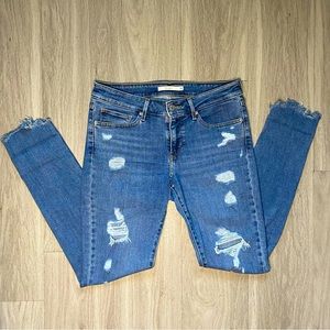 Levi’s 711 Distressed Skinny Jeans